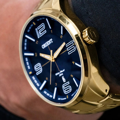 Orient Men's Gold-Tone Dress Watch with Blue Dial – 50M Water Resistant